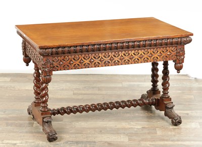 Lot 1671 - A 19TH CENTURY CARVED OAK GOTHIC STYLE LIBRARY TABLE