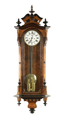 Lot 1497 - A LATE 19TH CENTURY WALNUT AND EBONISED VIENNA STYLE WALL CLOCK