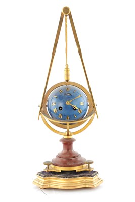 Lot 1444 - A 19TH CENTURY FRENCH ORMOLU AND ROUGE MARBLE MYSTERY CLOCK
