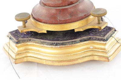 Lot 1444 - A 19TH CENTURY FRENCH ORMOLU AND ROUGE MARBLE MYSTERY CLOCK