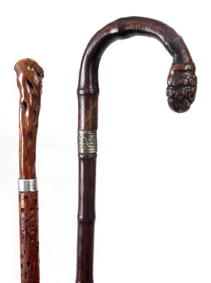 Lot 239 - TWO 19TH CENTURY SWORD STICKS one with...