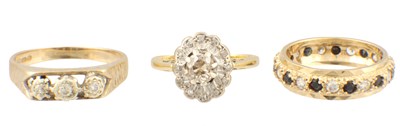 Lot 118 - A COLLECTION OF THREE LADIES GOLD AND DIAMOND RINGS