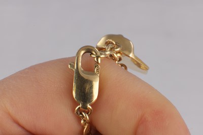 Lot 171 - A 9CT YELLOW GOLD CHARM BRACELET