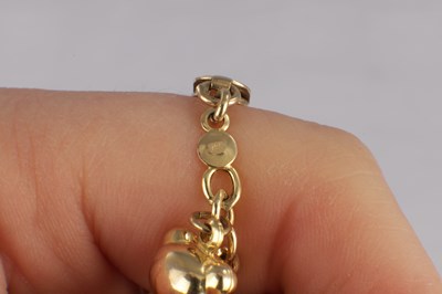 Lot 171 - A 9CT YELLOW GOLD CHARM BRACELET