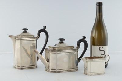 Lot 218 - A GEORGE V SILVER THREE PIECE TEA AND COFEE SERVICE