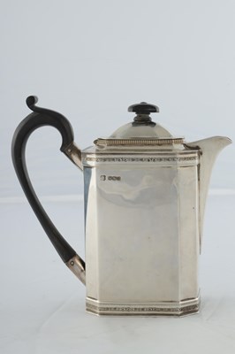 Lot 218 - A GEORGE V SILVER THREE PIECE TEA AND COFEE SERVICE
