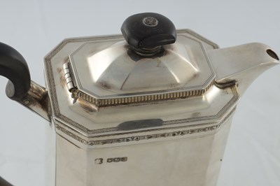Lot 218 - A GEORGE V SILVER THREE PIECE TEA AND COFEE SERVICE