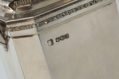 Lot 218 - A GEORGE V SILVER THREE PIECE TEA AND COFEE SERVICE
