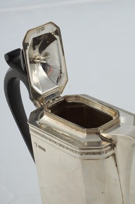 Lot 218 - A GEORGE V SILVER THREE PIECE TEA AND COFEE SERVICE
