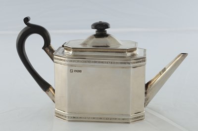 Lot 218 - A GEORGE V SILVER THREE PIECE TEA AND COFEE SERVICE