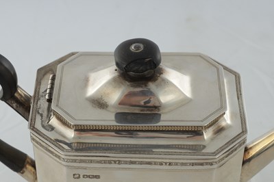 Lot 218 - A GEORGE V SILVER THREE PIECE TEA AND COFEE SERVICE
