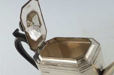 Lot 218 - A GEORGE V SILVER THREE PIECE TEA AND COFEE SERVICE