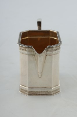 Lot 218 - A GEORGE V SILVER THREE PIECE TEA AND COFEE SERVICE