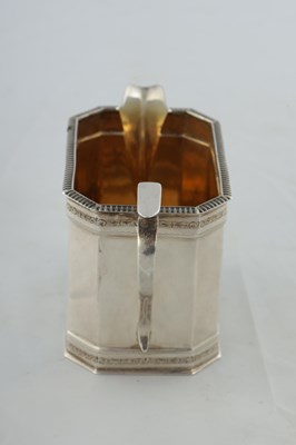 Lot 218 - A GEORGE V SILVER THREE PIECE TEA AND COFEE SERVICE