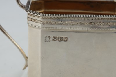 Lot 218 - A GEORGE V SILVER THREE PIECE TEA AND COFEE SERVICE
