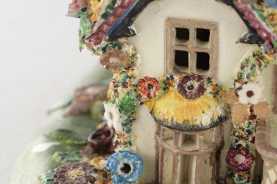 Lot 96 - A 19TH CENTURY STAFFORDSHIRE PORCELAIN "COTTAGE ORNEE" PASTILLE BURNER, AND A LEEDSWARE FLATBACK HOUSE
