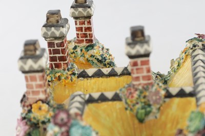Lot 96 - A 19TH CENTURY STAFFORDSHIRE PORCELAIN "COTTAGE ORNEE" PASTILLE BURNER, AND A LEEDSWARE FLATBACK HOUSE