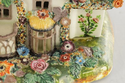 Lot 96 - A 19TH CENTURY STAFFORDSHIRE PORCELAIN "COTTAGE ORNEE" PASTILLE BURNER, AND A LEEDSWARE FLATBACK HOUSE