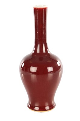 Lot 398 - A CHINESE QING DYNASTY KANGXI PERIOD IRON RED GLAZE BOTTLENECK VASE