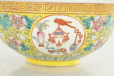 Lot 323 - A CHINESE IMPERIAL QING DYNASTY GUANXU PERIOD YELLOW GLAZE BOWL