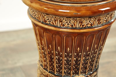 Lot 29 - A 19TH CENTURY TREACLE GLAZED MAJOLICA JARDINIERE ON STAND