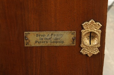 Lot 1038 - A LATE 19TH CENTURY “PENNY IN THE SLOT” UPRIGHT POLYPHON