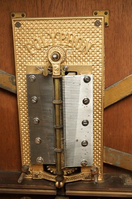 Lot 1038 - A LATE 19TH CENTURY “PENNY IN THE SLOT” UPRIGHT POLYPHON