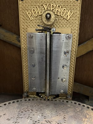 Lot 1038 - A LATE 19TH CENTURY “PENNY IN THE SLOT” UPRIGHT POLYPHON