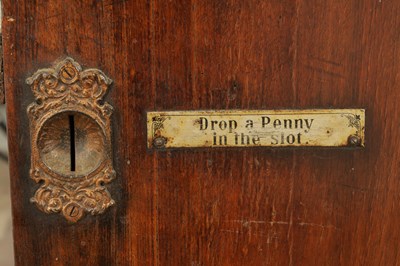 Lot 1024 - A LATE 19TH CENTURY “PENNY IN THE SLOT” UPRIGHT POLYPHON