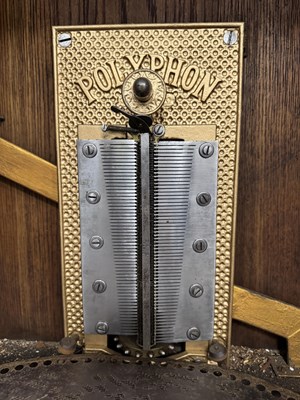 Lot 1024 - A LATE 19TH CENTURY “PENNY IN THE SLOT” UPRIGHT POLYPHON