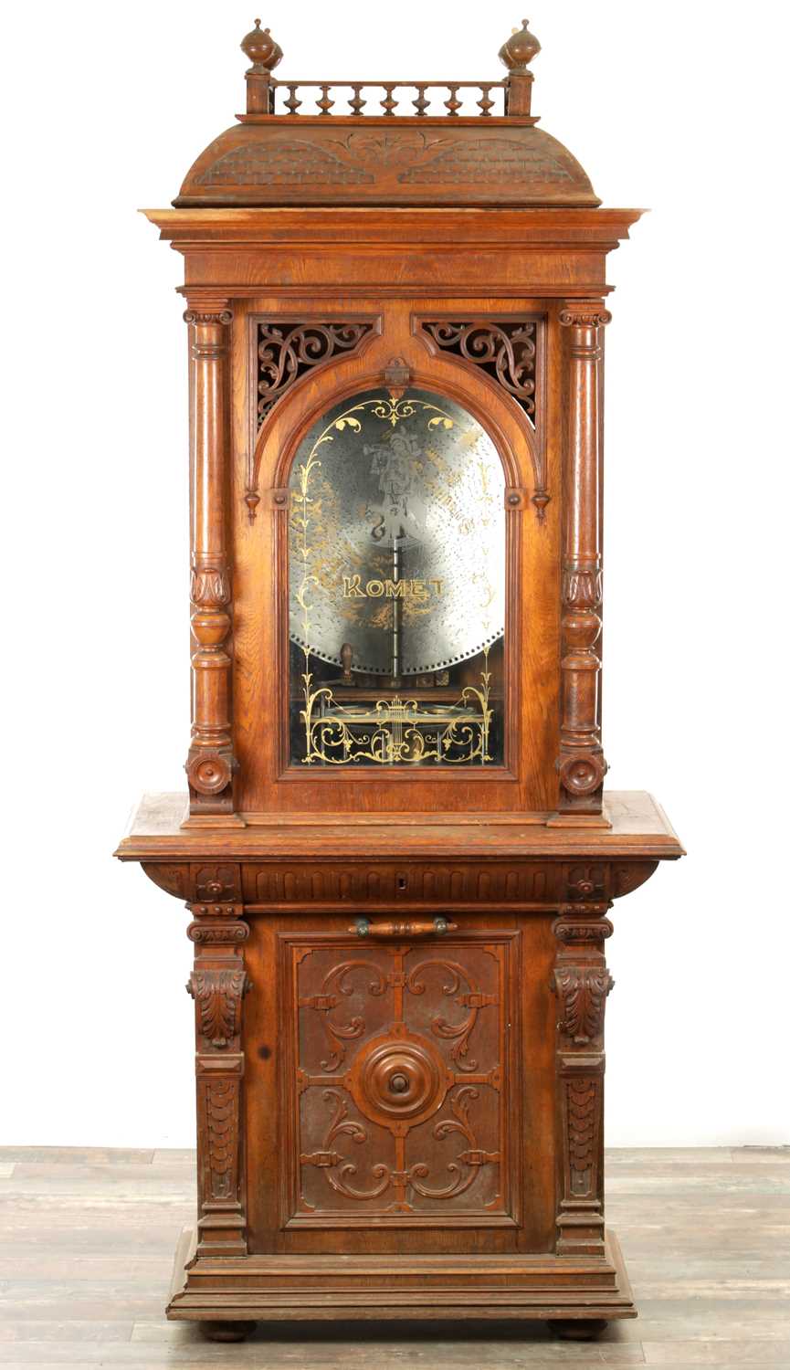 Lot 1035 - A RARE AND LARGE LATE 19TH CENTURY OAK CASED KOMET PENNY IN THE SLOT FLOOR STANDING POLYPHON TYPE MUSIC BOX