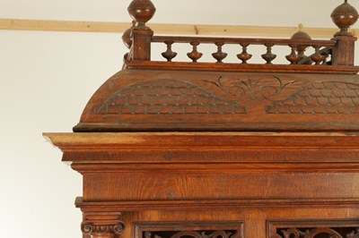 Lot 1035 - A RARE AND LARGE LATE 19TH CENTURY OAK CASED KOMET PENNY IN THE SLOT FLOOR STANDING POLYPHON TYPE MUSIC BOX