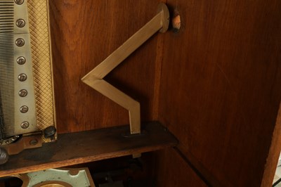 Lot 1035 - A RARE AND LARGE LATE 19TH CENTURY OAK CASED KOMET PENNY IN THE SLOT FLOOR STANDING POLYPHON TYPE MUSIC BOX