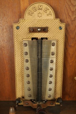 Lot 1035 - A RARE AND LARGE LATE 19TH CENTURY OAK CASED KOMET PENNY IN THE SLOT FLOOR STANDING POLYPHON TYPE MUSIC BOX