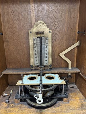 Lot 1035 - A RARE AND LARGE LATE 19TH CENTURY OAK CASED KOMET PENNY IN THE SLOT FLOOR STANDING POLYPHON TYPE MUSIC BOX