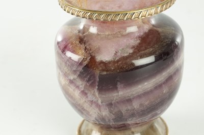 Lot 894 - A REGENCY STYLE PURPLE BANDED FLUORITE URN
