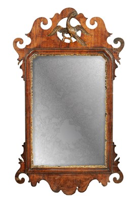 Lot 1755 - AN 18TH CENTURY WALNUT AND PARCEL GILT HANGING MIRROR