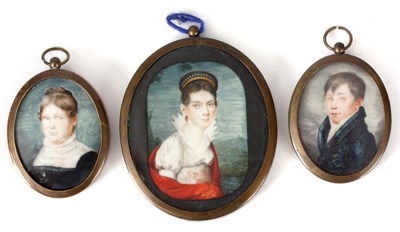 Lot 250 - A SET OF THREE MINIATURE PORTRAITS ON IVORY in...