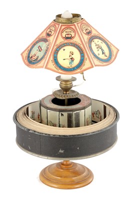 Lot 1004 - A LATE 19TH CENTURY FRENCH PRAXINOSCOPE OPTICAL TOY