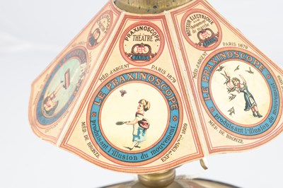Lot 1004 - A LATE 19TH CENTURY FRENCH PRAXINOSCOPE OPTICAL TOY