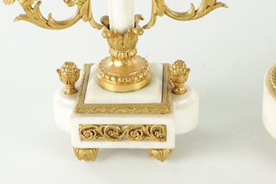 Lot 1470 - A LATE 19TH CENTURY FRENCH WHITE MARBLE AND ORMOLU CLOCK GARNITURE