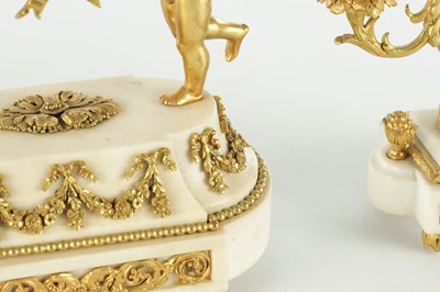 Lot 1470 - A LATE 19TH CENTURY FRENCH WHITE MARBLE AND ORMOLU CLOCK GARNITURE