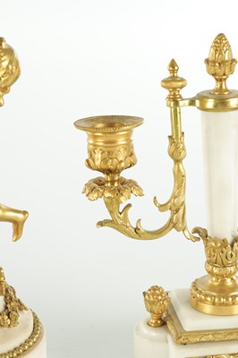 Lot 1470 - A LATE 19TH CENTURY FRENCH WHITE MARBLE AND ORMOLU CLOCK GARNITURE
