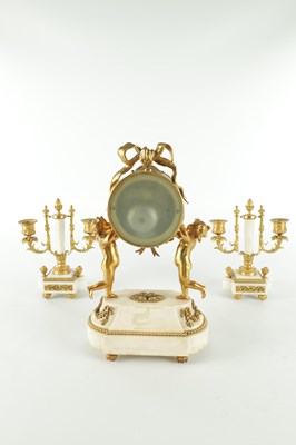 Lot 1470 - A LATE 19TH CENTURY FRENCH WHITE MARBLE AND ORMOLU CLOCK GARNITURE