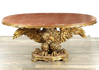 Lot 1587 - A DECORATIVE 20TH CENTURY GILT CARVED WOOD EAGLE CENTRE TABLE