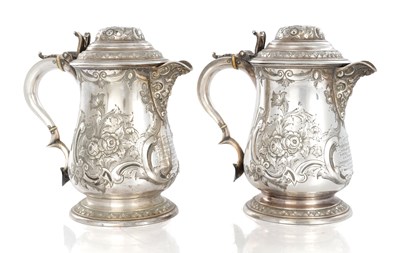 Lot 216 - A PAIR OF LARGE 19TH CENTURY MARTIN HALL & CO SILVER PLATED TANKARD JUGS
