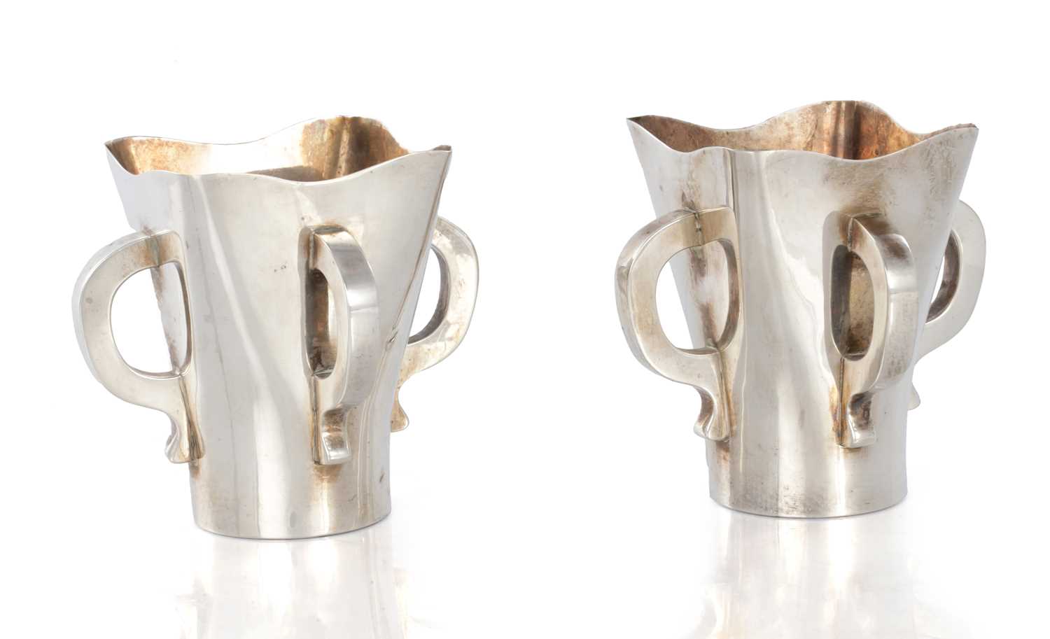 Lot 205 - A PAIR OF SCOTTISH SILVER ART AND CRAFTS VASES