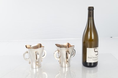 Lot 205 - A PAIR OF SCOTTISH SILVER ART AND CRAFTS VASES