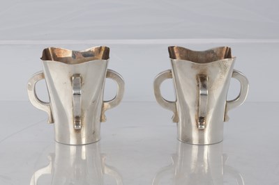 Lot 205 - A PAIR OF SCOTTISH SILVER ART AND CRAFTS VASES