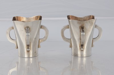 Lot 205 - A PAIR OF SCOTTISH SILVER ART AND CRAFTS VASES